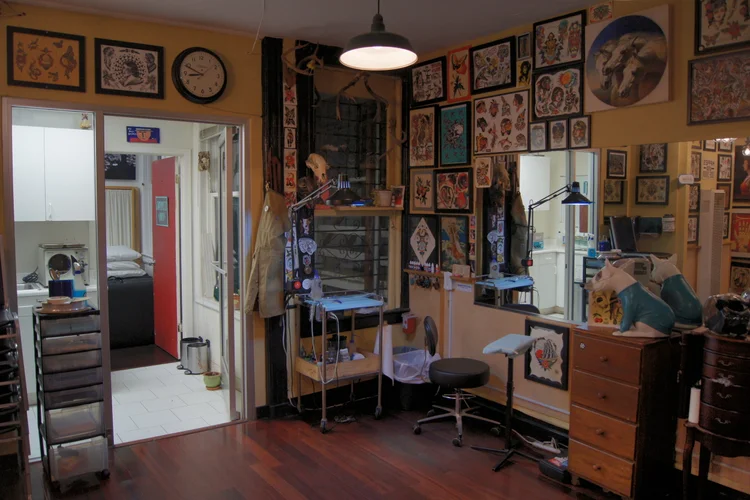 Interior with flash art, skull mounts, and pendant lighting